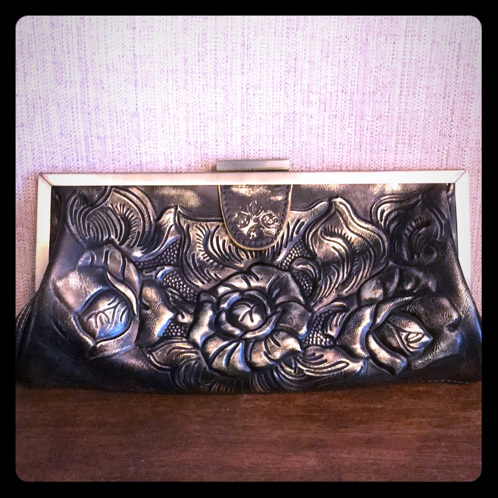 Distressed, vintage-looking clutch